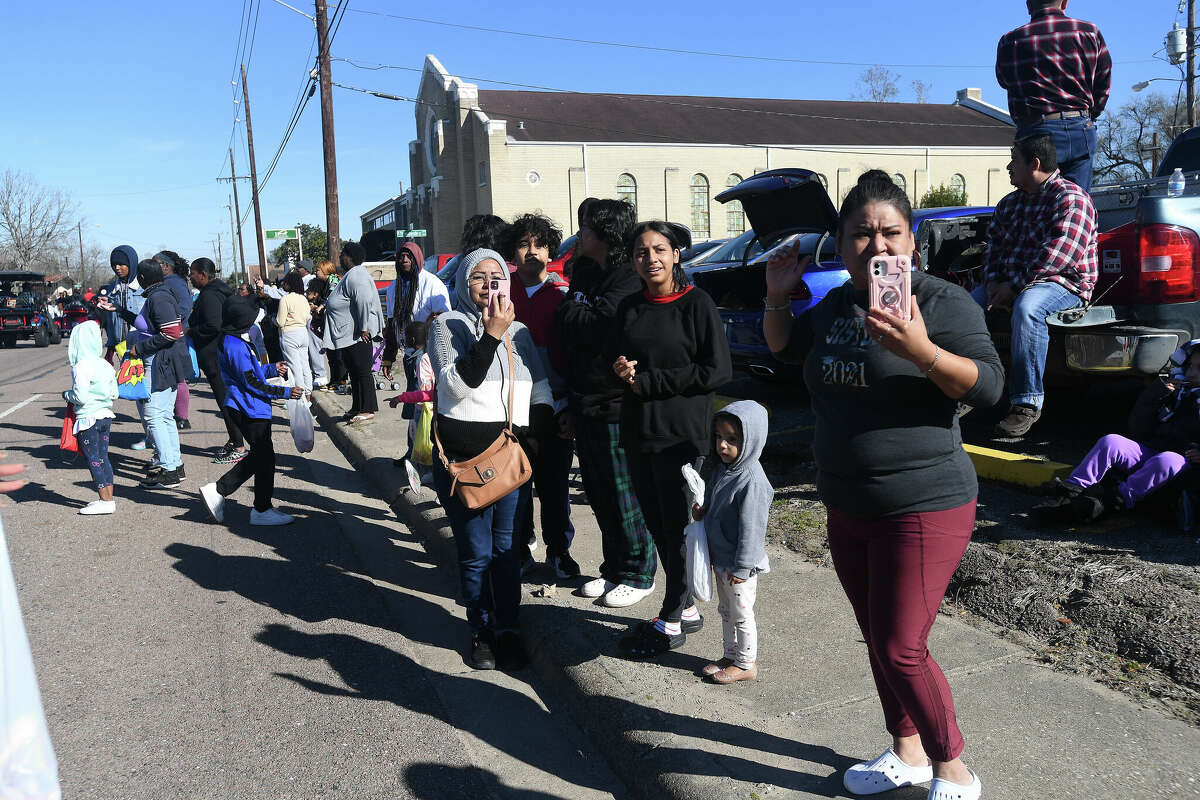 A crowd lines the route as the Martin Luther King, Jr., parade makes its way up Highland Avenue Saturday. Photo made Saturday, January 14, 2023 Kim Brent/Beaumont Enterprise