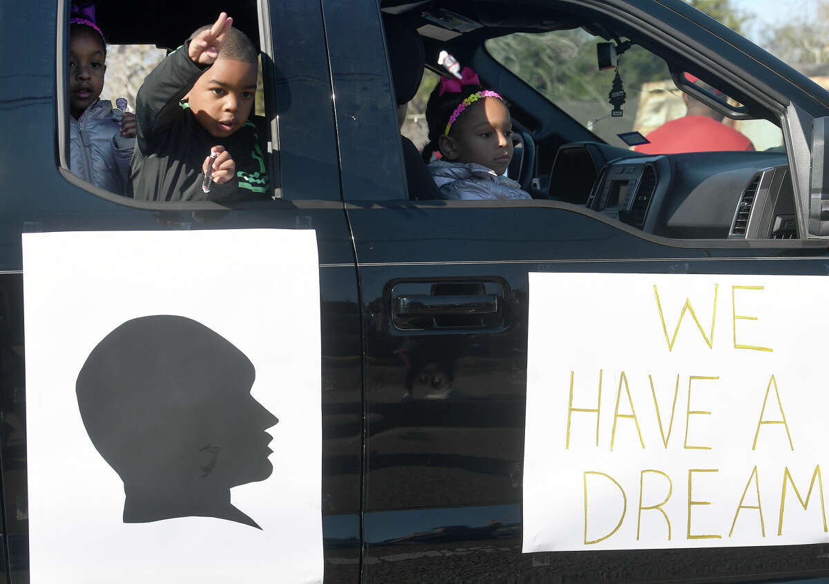 A crowd lines the route as the Martin Luther King, Jr., parade makes its way up Highland Avenue Saturday. Photo made Saturday, January 14, 2023 Kim Brent/Beaumont Enterprise