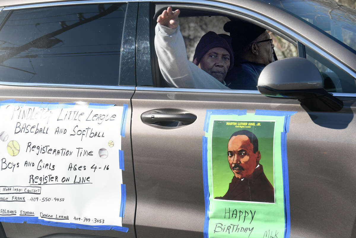 A crowd lines the route as the Martin Luther King, Jr., parade makes its way up Highland Avenue Saturday. Photo made Saturday, January 14, 2023 Kim Brent/Beaumont Enterprise