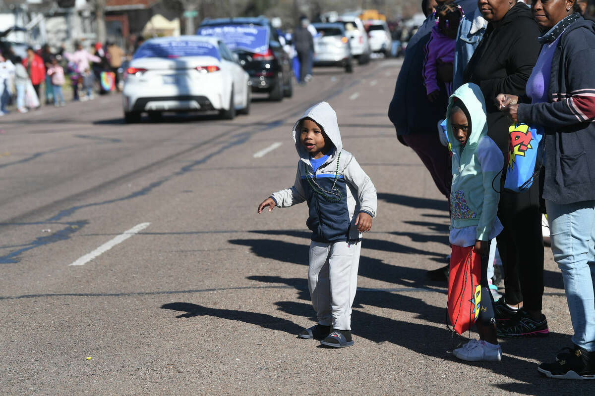 A crowd lines the route as the Martin Luther King, Jr., parade makes its way up Highland Avenue Saturday. Photo made Saturday, January 14, 2023 Kim Brent/Beaumont Enterprise