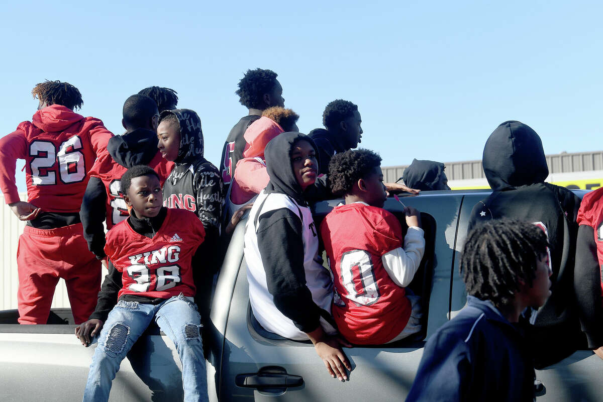 A crowd lines the route as the Martin Luther King, Jr., parade makes its way up Highland Avenue Saturday. Photo made Saturday, January 14, 2023 Kim Brent/Beaumont Enterprise