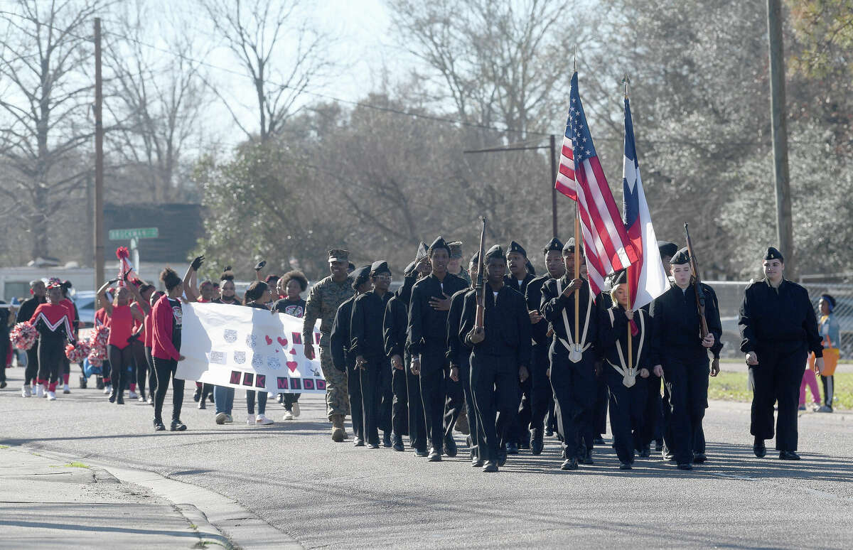 A crowd lines the route as the Martin Luther King, Jr., parade makes its way up Highland Avenue Saturday. Photo made Saturday, January 14, 2023 Kim Brent/Beaumont Enterprise
