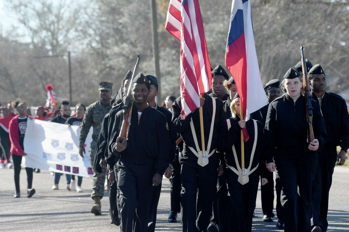 A crowd lines the route as the Martin Luther King, Jr., parade makes its way up Highland Avenue Saturday. Photo made Saturday, January 14, 2023 Kim Brent/Beaumont Enterprise