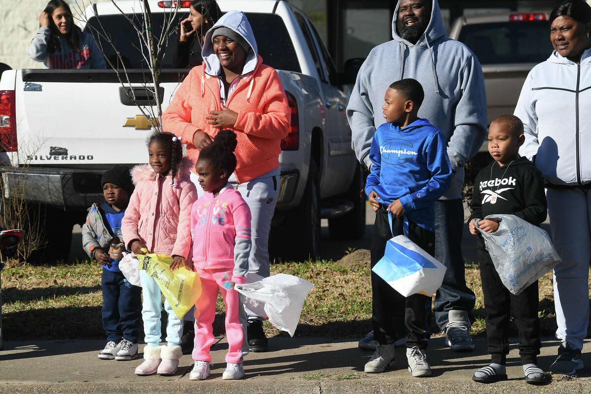 A crowd lines the route as the Martin Luther King, Jr., parade makes its way up Highland Avenue Saturday. Photo made Saturday, January 14, 2023 Kim Brent/Beaumont Enterprise