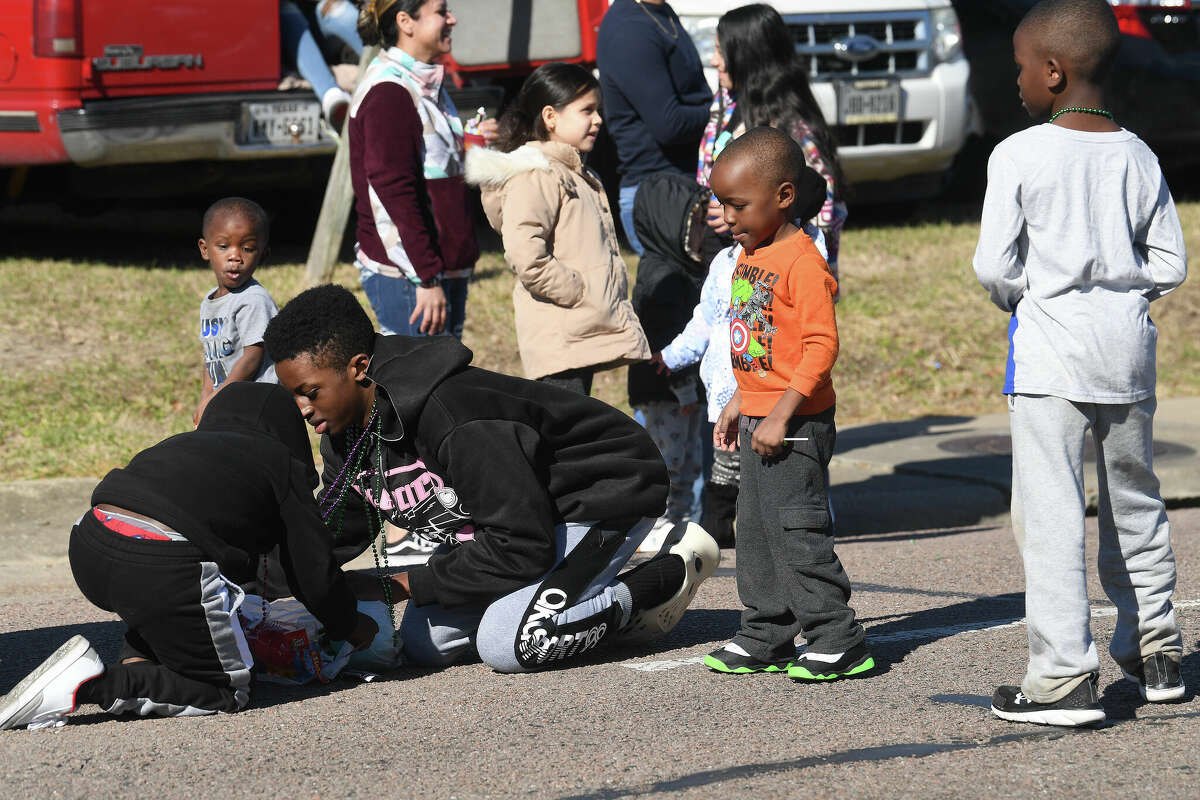 A crowd lines the route as the Martin Luther King, Jr., parade makes its way up Highland Avenue Saturday. Photo made Saturday, January 14, 2023 Kim Brent/Beaumont Enterprise
