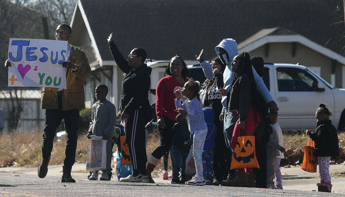 A crowd lines the route as the Martin Luther King, Jr., parade makes its way up Highland Avenue Saturday. Photo made Saturday, January 14, 2023 Kim Brent/Beaumont Enterprise