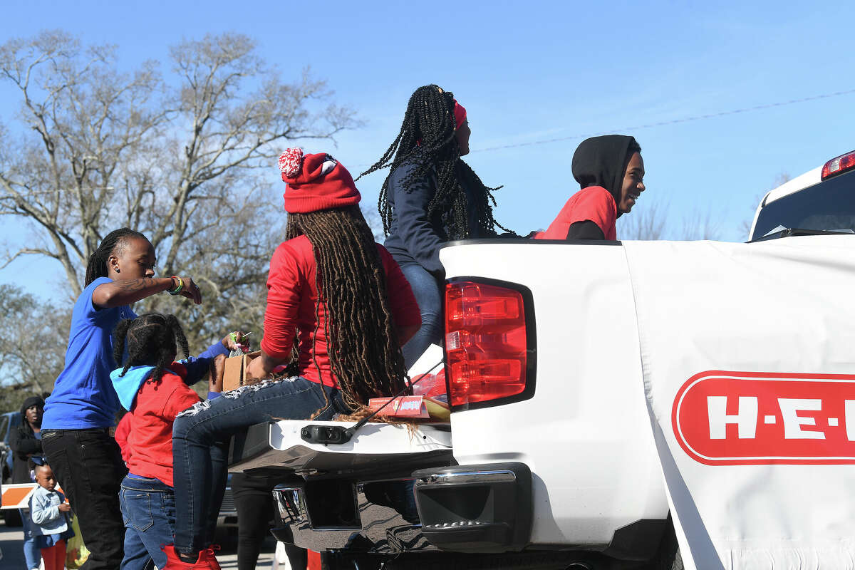 A crowd lines the route as the Martin Luther King, Jr., parade makes its way up Highland Avenue Saturday. Photo made Saturday, January 14, 2023 Kim Brent/Beaumont Enterprise