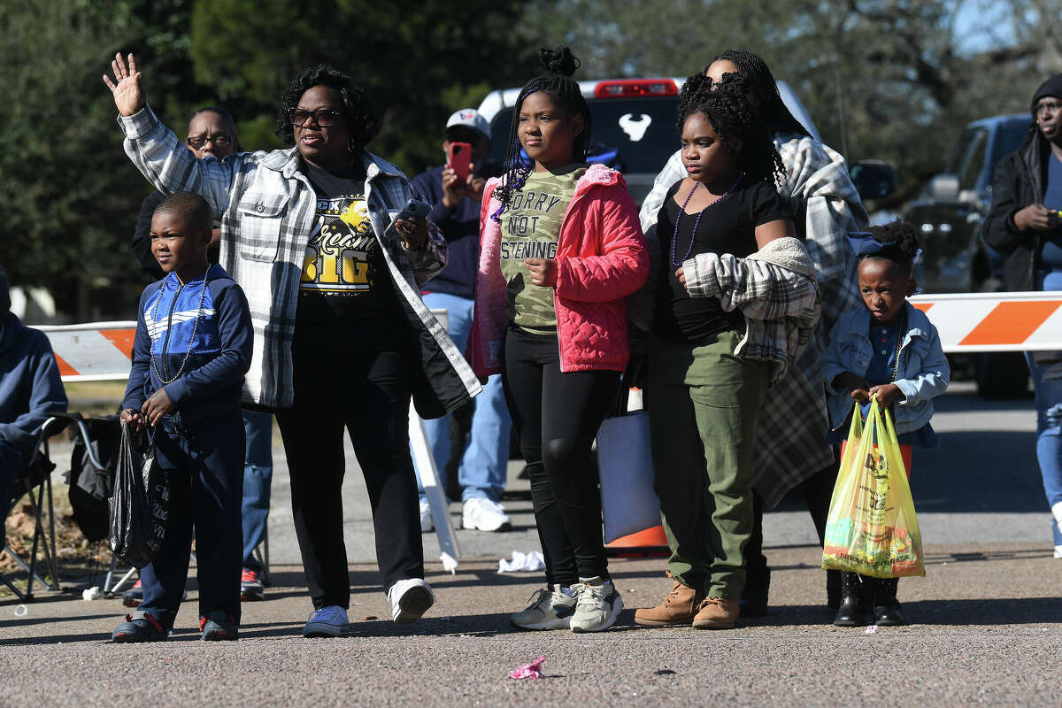 A crowd lines the route as the Martin Luther King, Jr., parade makes its way up Highland Avenue Saturday. Photo made Saturday, January 14, 2023 Kim Brent/Beaumont Enterprise