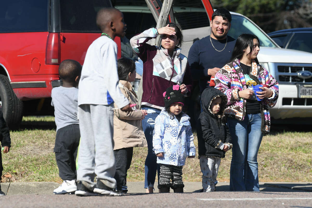 A crowd lines the route as the Martin Luther King, Jr., parade makes its way up Highland Avenue Saturday. Photo made Saturday, January 14, 2023 Kim Brent/Beaumont Enterprise