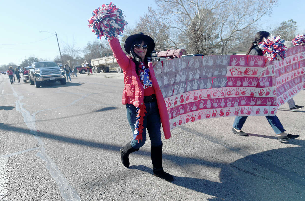 A crowd lines the route as the Martin Luther King, Jr., parade makes its way up Highland Avenue Saturday. Photo made Saturday, January 14, 2023 Kim Brent/Beaumont Enterprise