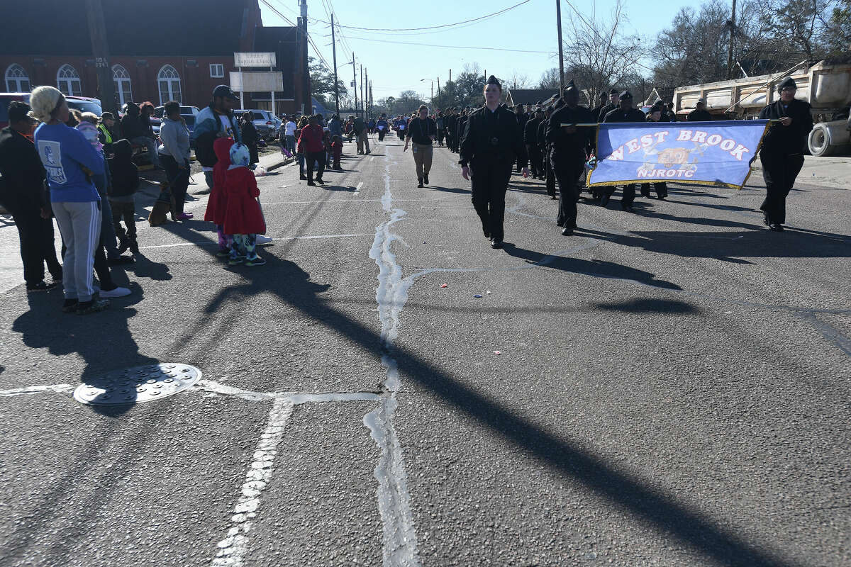 A crowd lines the route as the Martin Luther King, Jr., parade makes its way up Highland Avenue Saturday. Photo made Saturday, January 14, 2023 Kim Brent/Beaumont Enterprise
