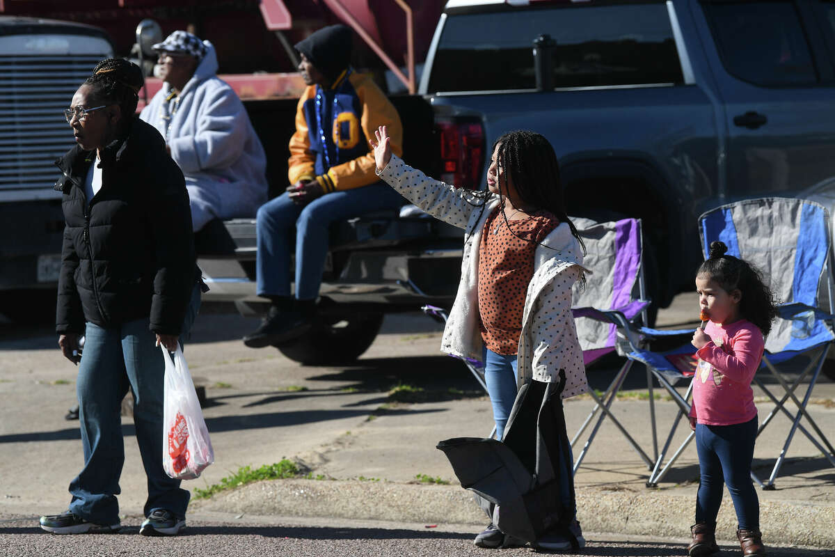 A crowd lines the route as the Martin Luther King, Jr., parade makes its way up Highland Avenue Saturday. Photo made Saturday, January 14, 2023 Kim Brent/Beaumont Enterprise