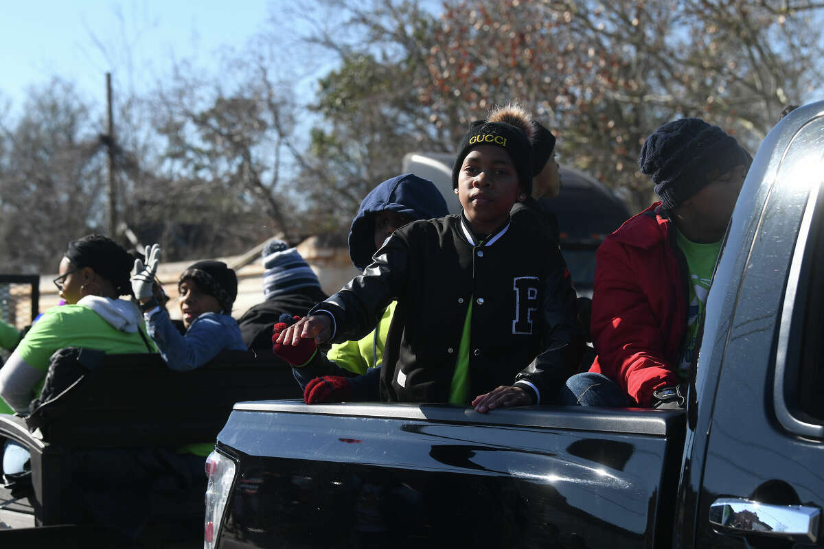 A crowd lines the route as the Martin Luther King, Jr., parade makes its way up Highland Avenue Saturday. Photo made Saturday, January 14, 2023 Kim Brent/Beaumont Enterprise