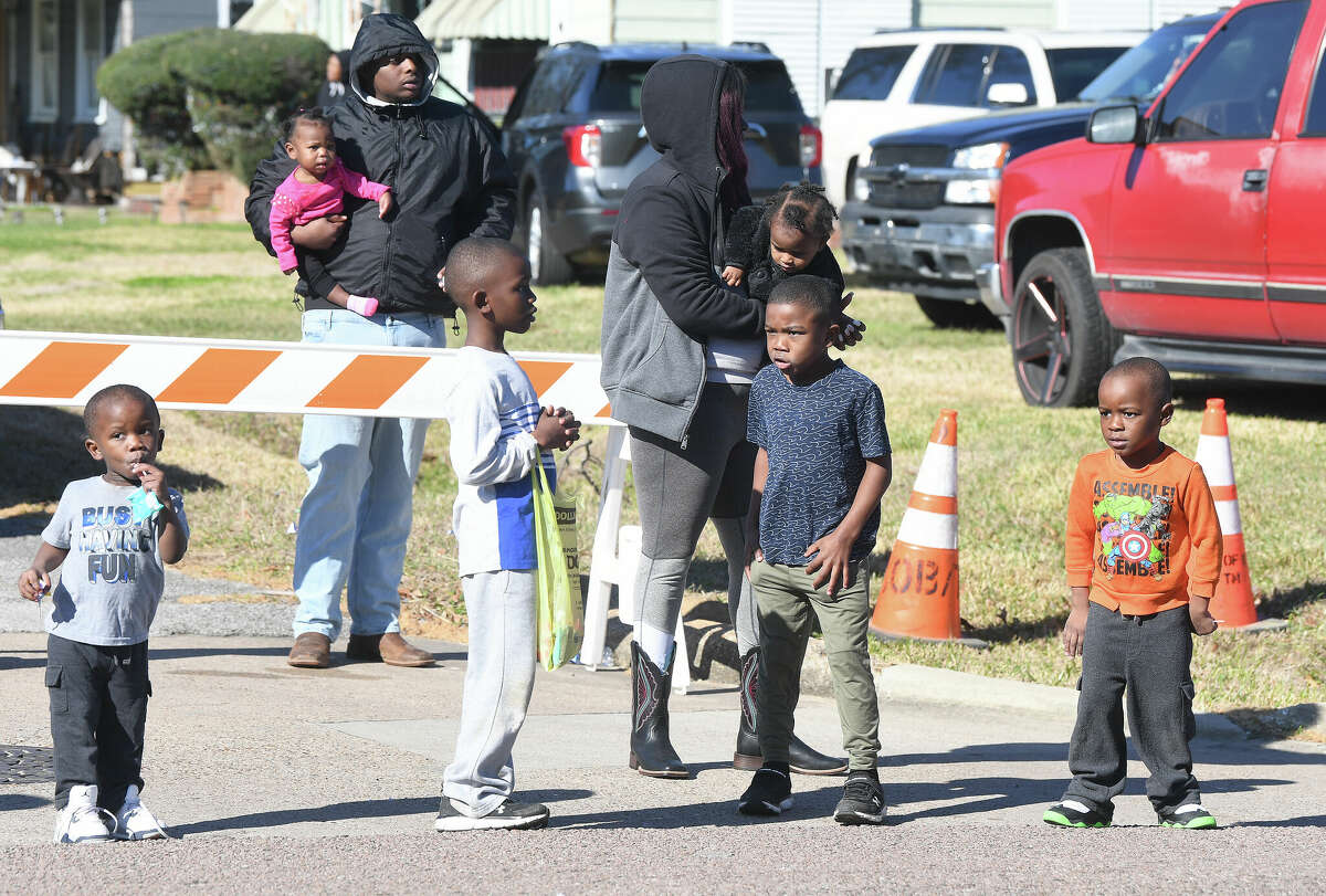 A crowd lines the route as the Martin Luther King, Jr., parade makes its way up Highland Avenue Saturday. Photo made Saturday, January 14, 2023 Kim Brent/Beaumont Enterprise