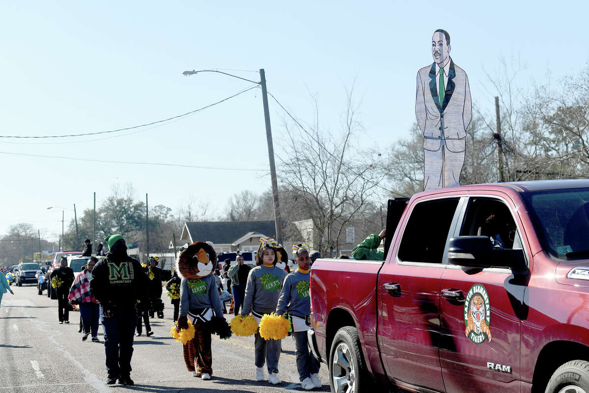 A crowd lines the route as the Martin Luther King, Jr., parade makes its way up Highland Avenue Saturday. Photo made Saturday, January 14, 2023 Kim Brent/Beaumont Enterprise