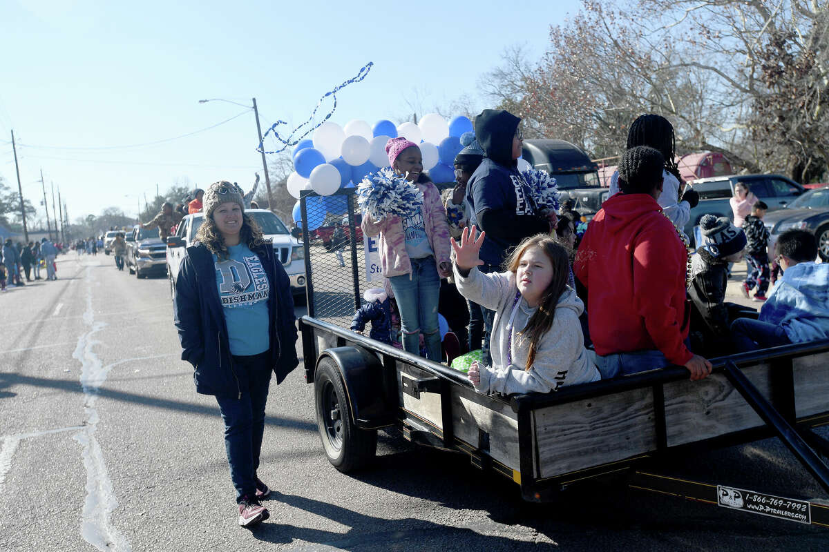 A crowd lines the route as the Martin Luther King, Jr., parade makes its way up Highland Avenue Saturday. Photo made Saturday, January 14, 2023 Kim Brent/Beaumont Enterprise
