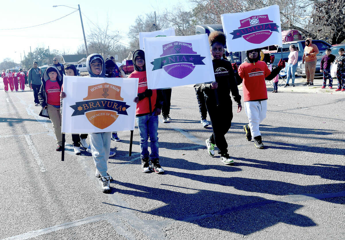 A crowd lines the route as the Martin Luther King, Jr., parade makes its way up Highland Avenue Saturday. Photo made Saturday, January 14, 2023 Kim Brent/Beaumont Enterprise