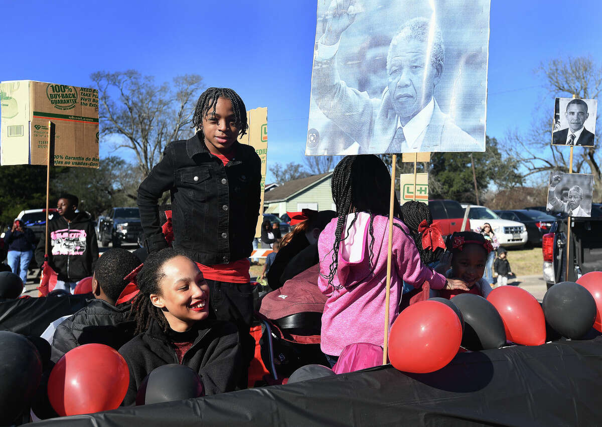 A crowd lines the route as the Martin Luther King, Jr., parade makes its way up Highland Avenue Saturday. Photo made Saturday, January 14, 2023 Kim Brent/Beaumont Enterprise
