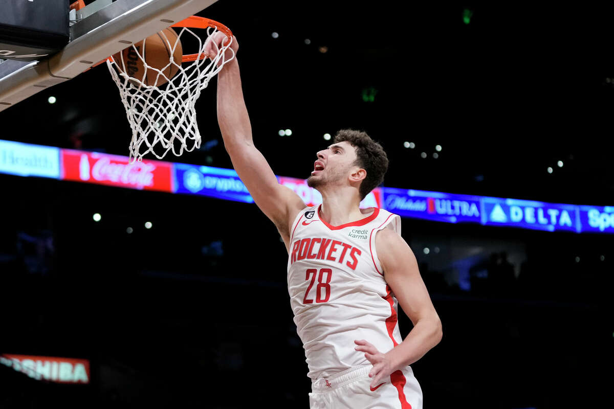 Houston Rockets' Alperen Sengun dunks during the second half of an NBA basketball game against the Los Angeles Lakers Monday, Jan. 16, 2023, in Los Angeles. The Lakers won 140-132. (AP Photo/Jae C. Hong)