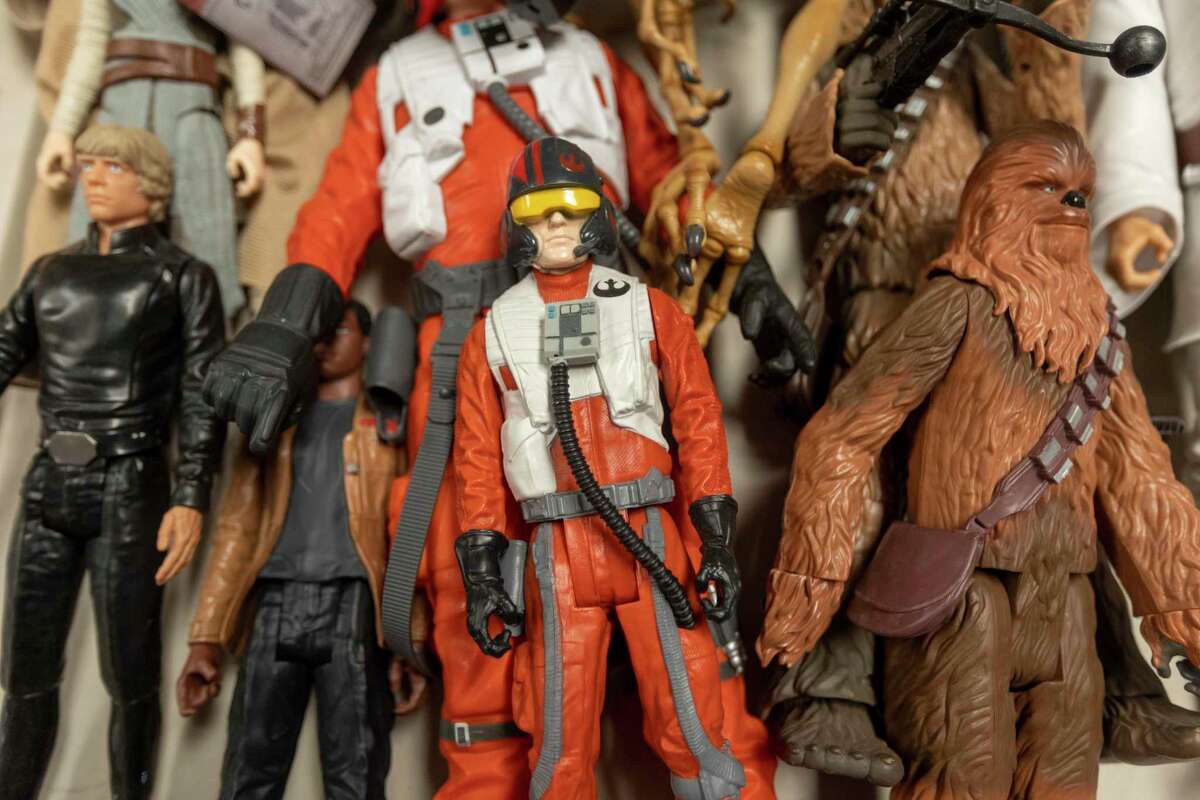 “Star Wars” figures s are among the items being auctioned from Chris Pettit’s estate to raise money to pay his creditors.