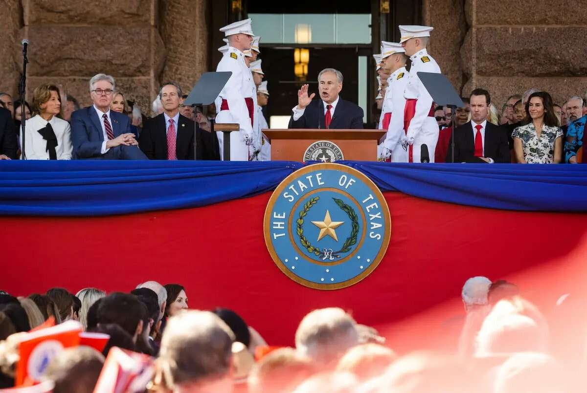 Gov. Greg Abbott addresses attendees at his oath-of-office ceremony Tuesday on the state Capitol grounds.