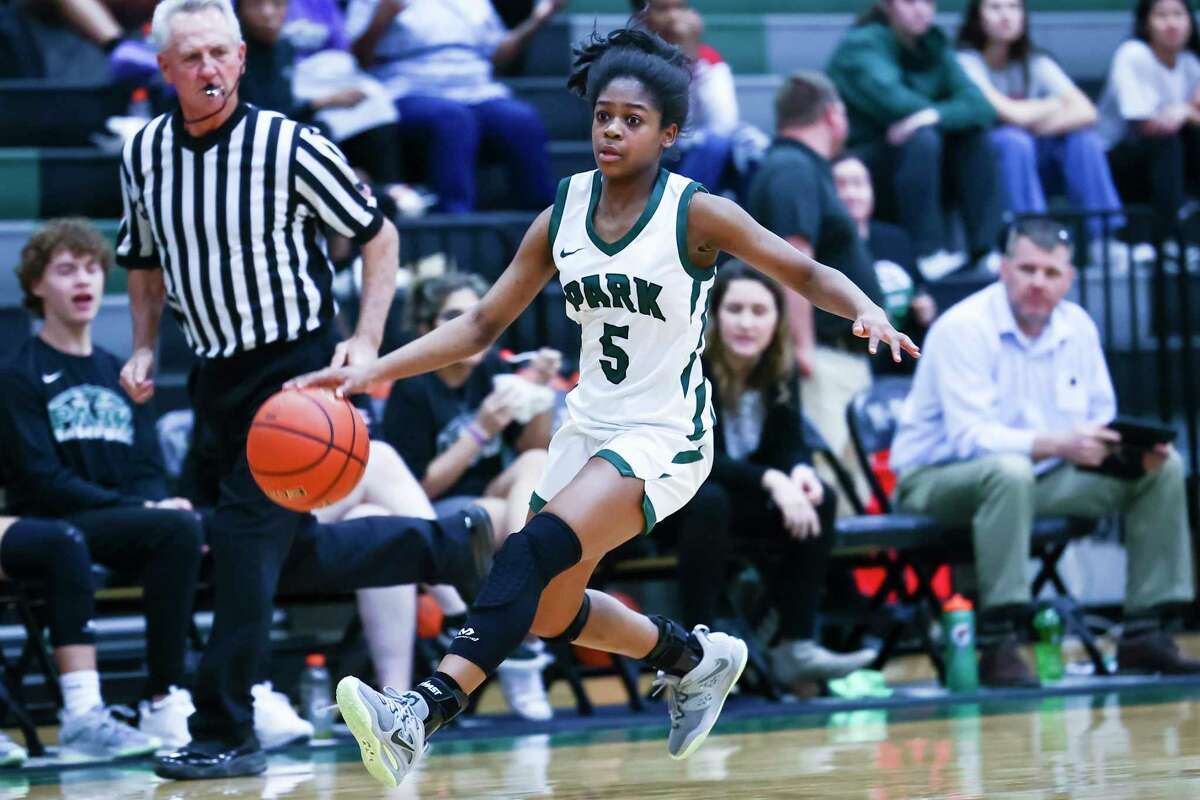 Kingwood Park’s Aniah Cross (5) drives the ball down court in the second half of a District 16-5A girls high school basketball game between the Lufkin Panthers and the Kingwood Park Panthers at Kingwood Park High School in Kingwood, TX on Tuesday, January 17, 2023. Kingwood Park beat Lufkin 64-53.