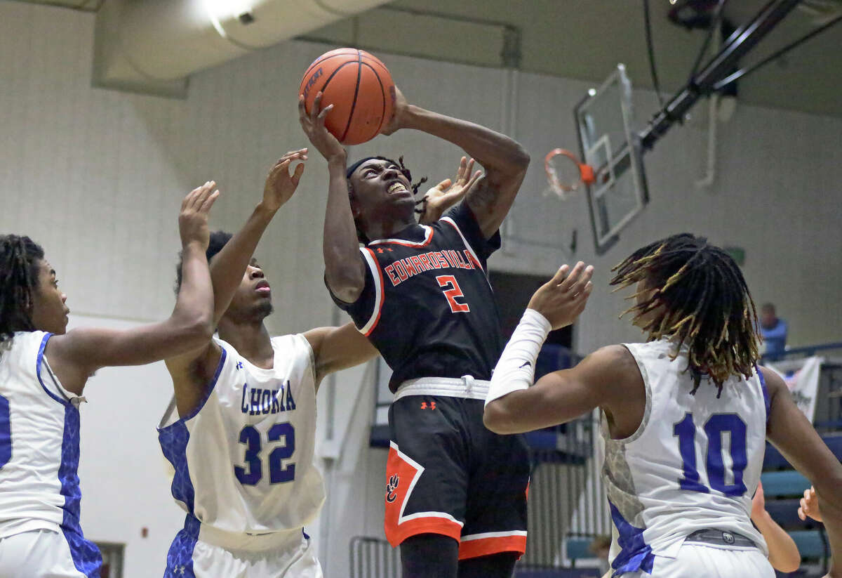 Malik Allen finishes a contested layup during Edwardsville's 75-43 win over Cahokia on Tuesday in the opening game of the Jerseyville Mid-Winter Classic. Allen led all scorers with 22 points. 