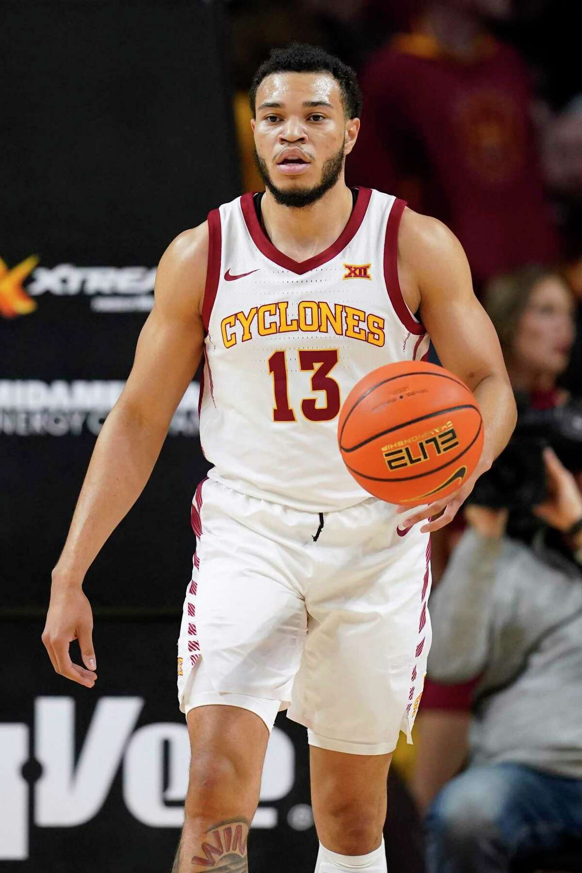 Iowa State guard Jaren Holmes drives up court during the first half of Tuesday’s game in Ames, Iowa.