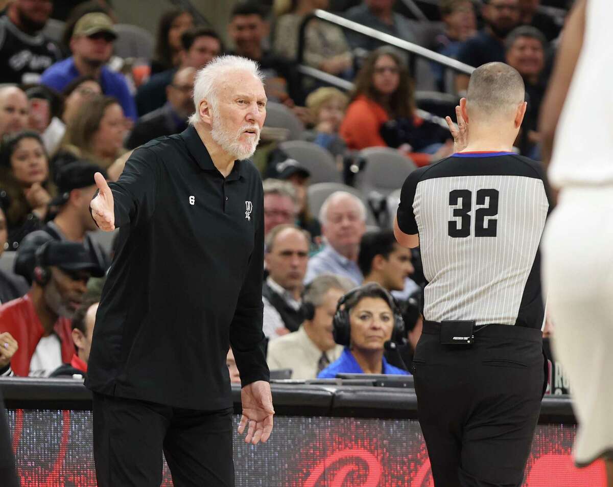 Spurs head coach Gregg Popovich questions game official Marat Kogut after a call against the Spurs during their game against the Brooklyn Nets at the AT&T Center on Tuesday.