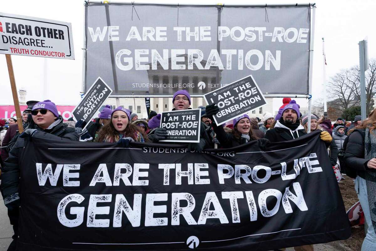 FILE - Anti-abortion activists march outside of the U.S. Supreme Court during the March for Life in Washington, Jan. 21, 2022. Anti-abortion activists will have multiple reasons to celebrate – and some reasons for unease -- when they gather Friday, Jan. 20, 2023 in Washington for the annual March for Life. The march has been held since January 1974 – a year after the U.S. Supreme Court’s Roe v. Wade decision established a nationwide right to abortion.