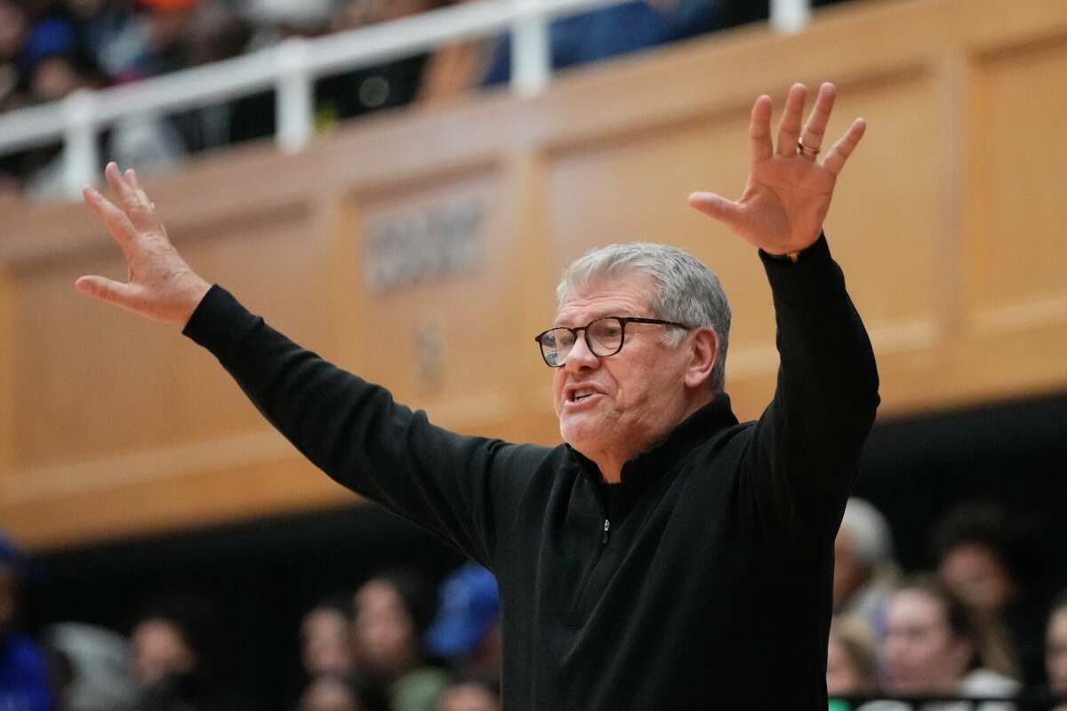 Connecticut head coach Geno Auriemma calls out to his team during the first half of an NCAA basetball game against the Seton Hall Tuesday, Jan. 17, 2023, in South Orange, N.J. (AP Photo/Frank Franklin II)