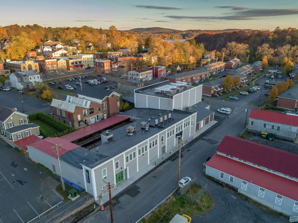 The main building of the Lumberyard arts complex in Catskillis is seen at center, with Catskill's Main Street at top and Lumberyard's waterfront properties at right. Opened in 2015 after three years of renovation, Lumberyard is being sold by its parent organization, the New York City-based American Dance Institute, as the institute refocuses its mission.