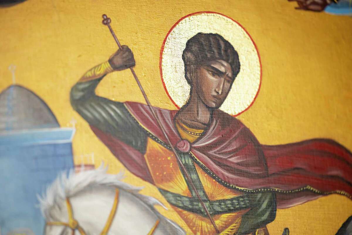 A painting of St. George by sacred art artist and iconographer Al Sauls in the Link Lee Mansion at the University of St. Thomas on Friday, Jan. 13, 2023.
