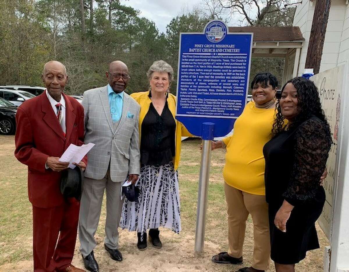 From left, Sam Stewart, Rev. Charles Spriggs, Annette Kerr, Annie Brooks and Karen Dixon are pictured at Piney Grove Missionary Baptist Church in Magnolia following the dedication of a historical marker there Sunday afternoon.