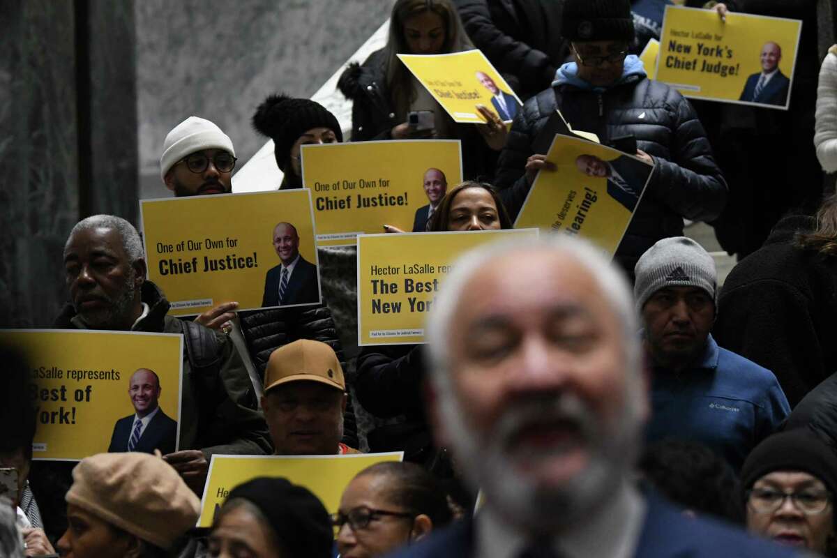 Advocates in favor of Appellate Division Justice Hector D. LaSalle’s nomination as chief judge of the Court of Appeals stage a rally head of a Senate Judiciary Committee hearing to rule on his recommendation on Wednesday, Jan. 18, 2023, at the Legislative Office Building in Albany, N.Y. His advancement was voted down.