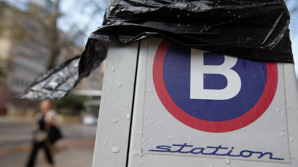 A B-Cycle station outside the Harris County Civil Courthouse is shut down and wrapped in black plastic Wednesday, Jan. 18, 2023, in Houston. B-Cycle shuttered about half of the 150 stations in the area in November, as part of what they call a cost saving move during winter.