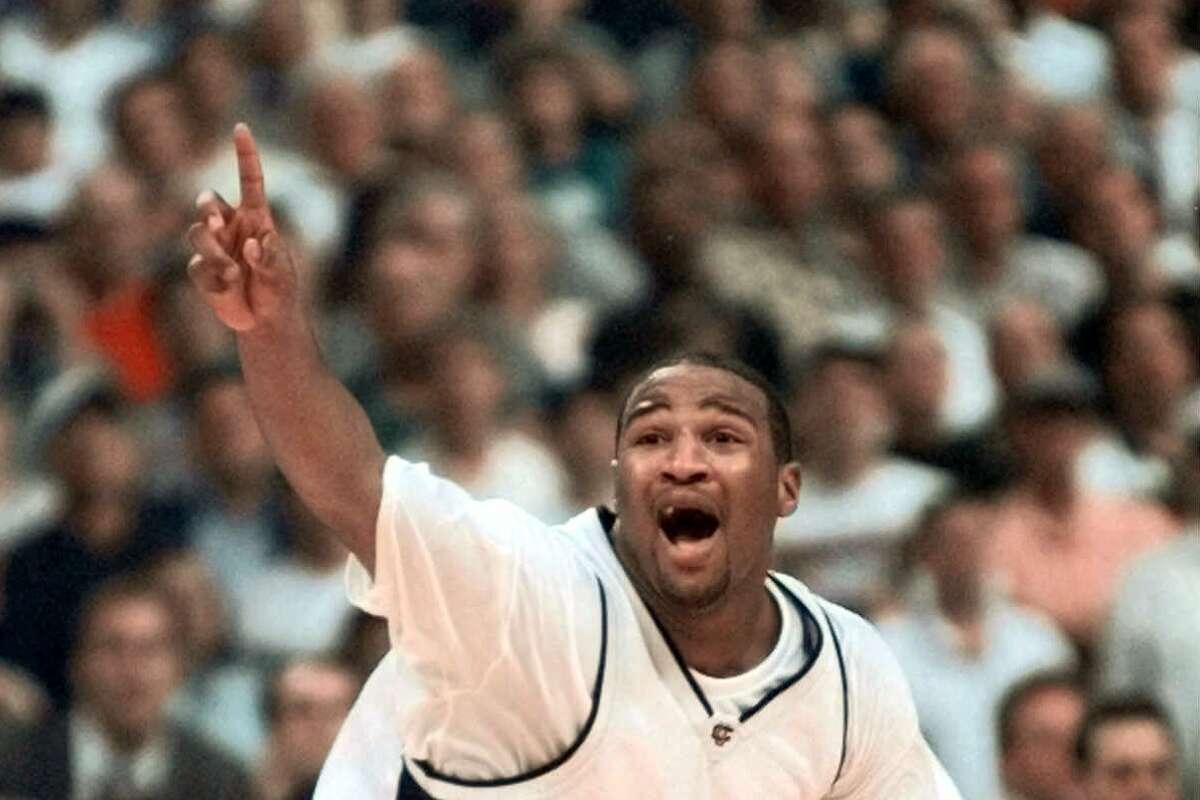 Connecticut's Khalid El-Amin celebrates as time runs out and UConn defeats Duke 77-74 in the championship game of the NCAA Final Four, Monday, March 29, 1999, at Tropicana Field in St. Petersburg, Fla. (AP Photo/Eric Draper)