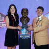 Edward DeBartolo, Jr. (R), former San Francisco 49ers Owner, is seen with his bronze bust and his daughter, Lisa DeBartolo (L), during the NFL Hall of Fame Enshrinement Ceremony at the Tom Benson Hall of Fame Stadium on August 6, 2016 in Canton, Ohio. (Photo by Joe Robbins/Getty Images)