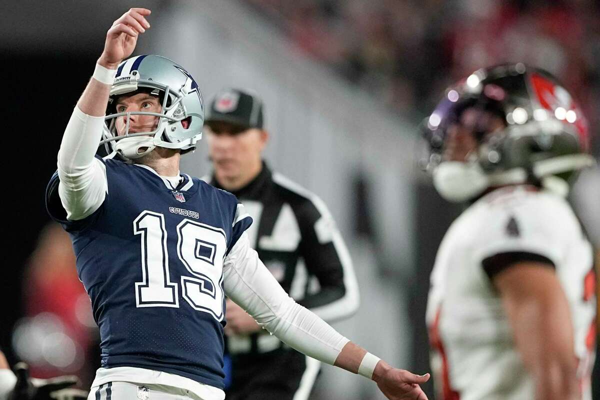 Dallas Cowboys place kicker Brett Maher (19) watches his extra point miss against the Tampa Bay Buccaneers during the second half of an NFL wild-card football game, Monday, Jan. 16, 2023, in Tampa, Fla. (AP Photo/Chris Carlson)