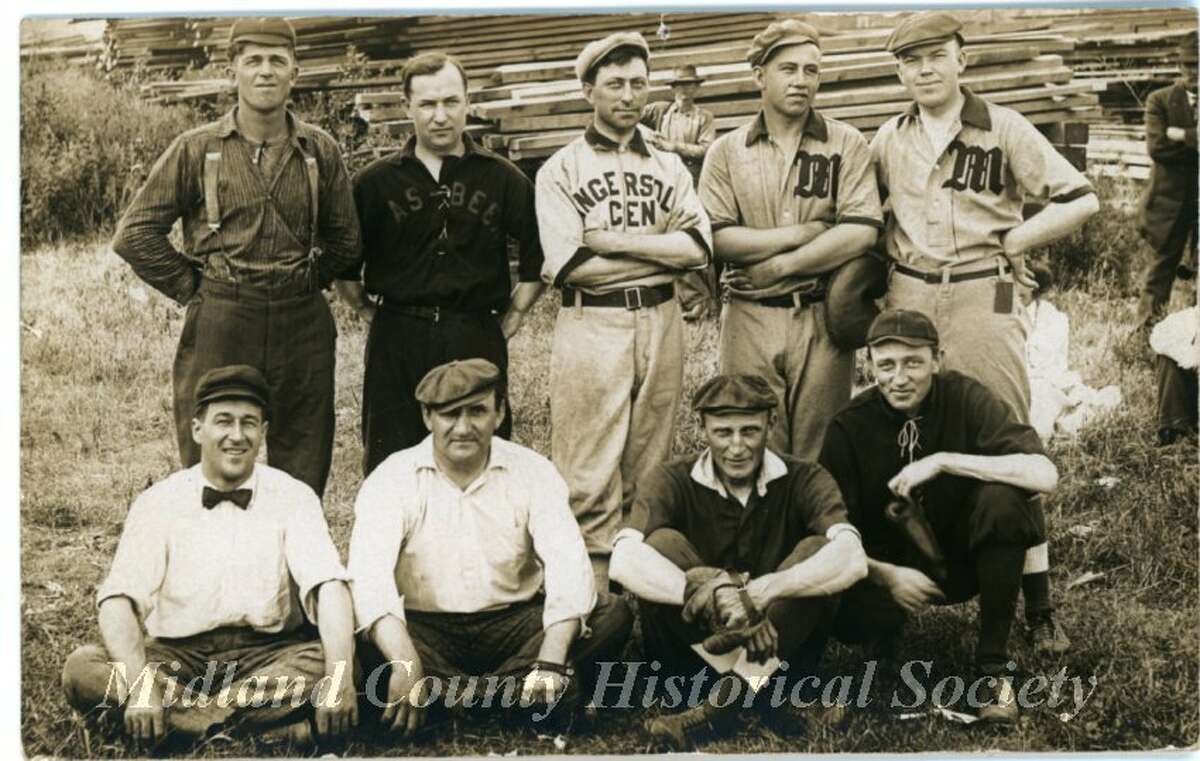 Postcard photograph of the South Side baseball team, date could range from 1918 to 1930. Shown in the back row, from left, John Whitman, Nic Mckay, Cliff Graves, C. Towsley, G. Currie. Front row, from left to right is: Gus Stark, Ray Hart, Andrew S. Arbury, and L. Dickey. 