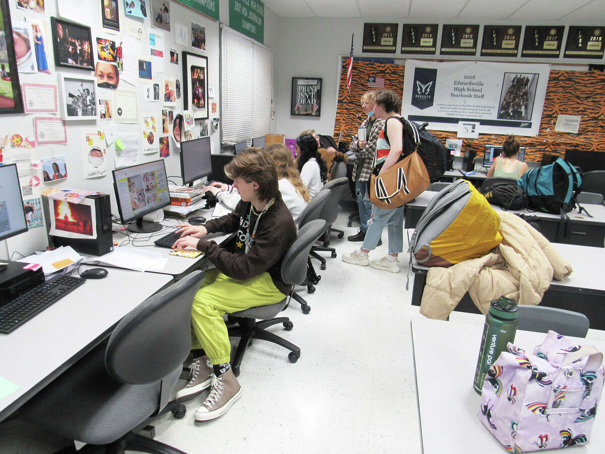 Members of the Edwardsville High School yearbook staff work on the 2023 volume of the Tiger at the EHS Media Center.