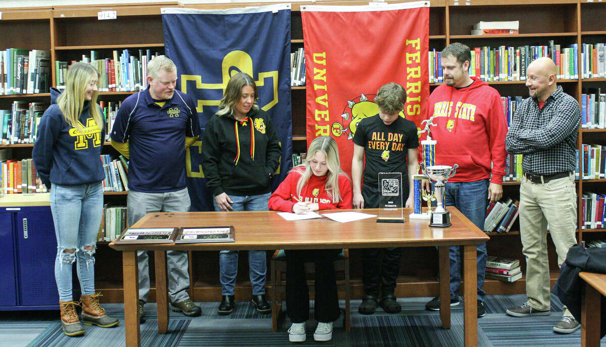 Manistee senior Lacey Zimmerman signs her letter of intent to run track an Ferris State University on Jan. 19 at Manistee High School 