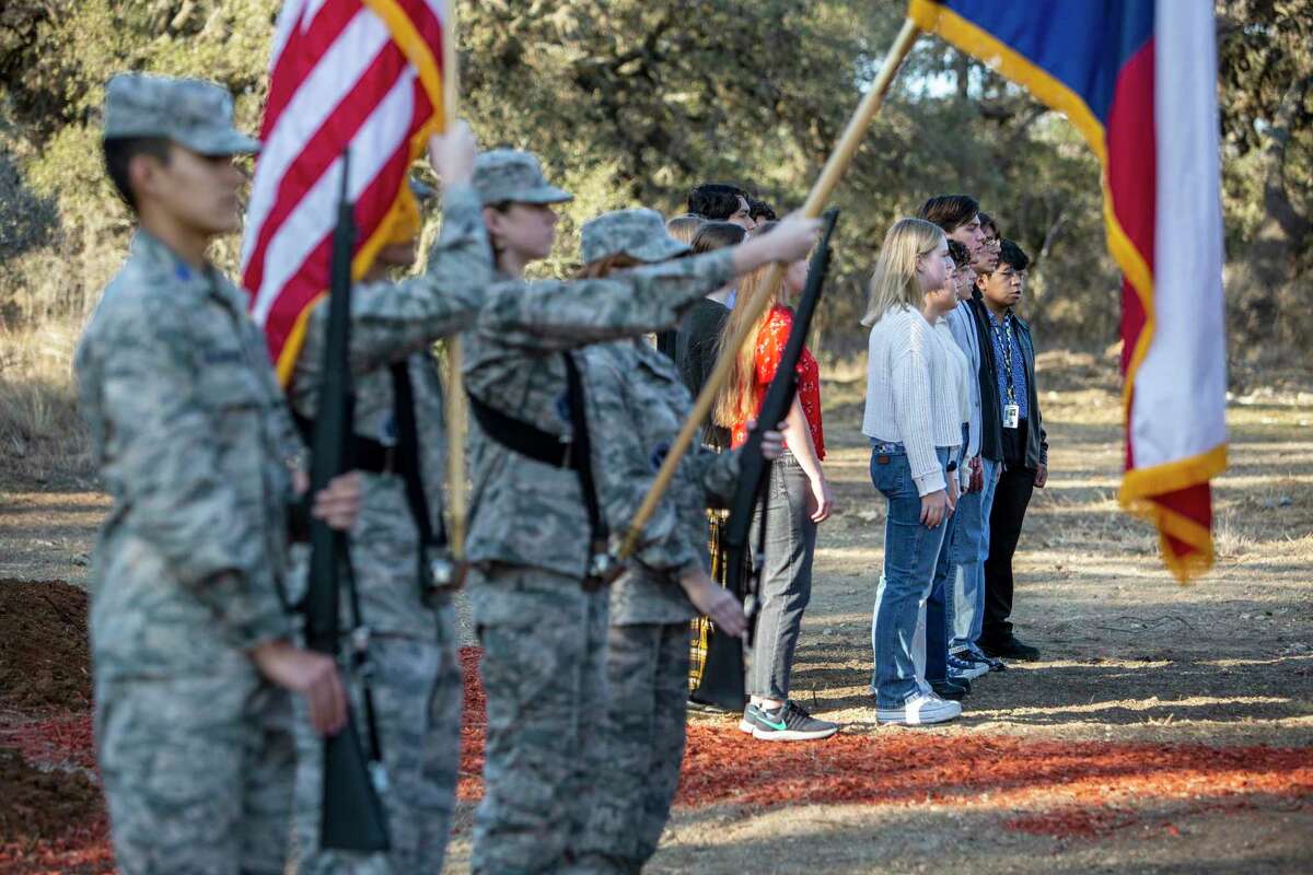 A Boerne Independent School District Air Force JROTC color guard presents the colors Wednesday, Jan. 18, 2023, while a Champion High School choir sings the national anthem during a groundbreaking for the burgeoning district’s eighth elementary school.
