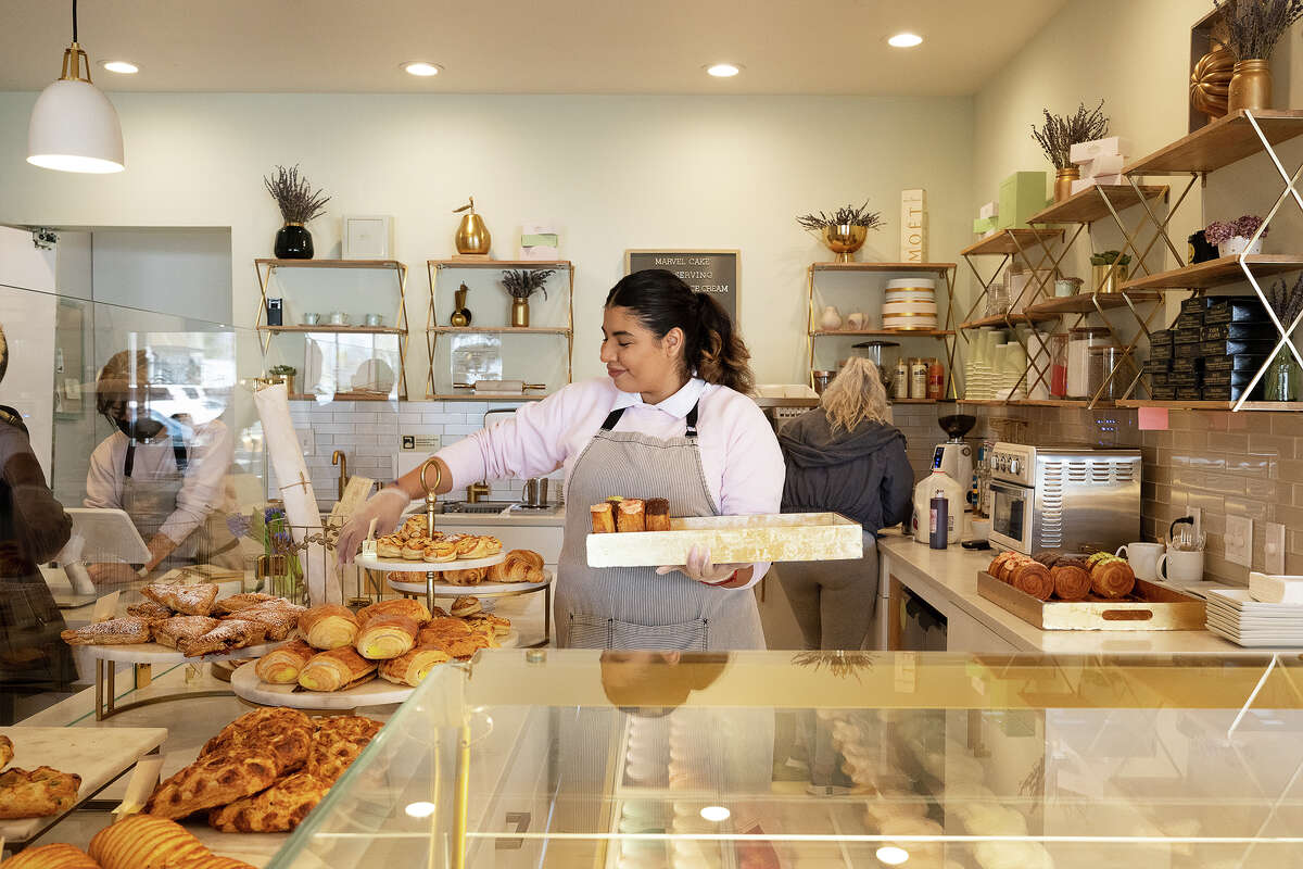 Daniela Fabre helping customers at Marvel Cake in Campbell CA, Jan. 13, 2023
