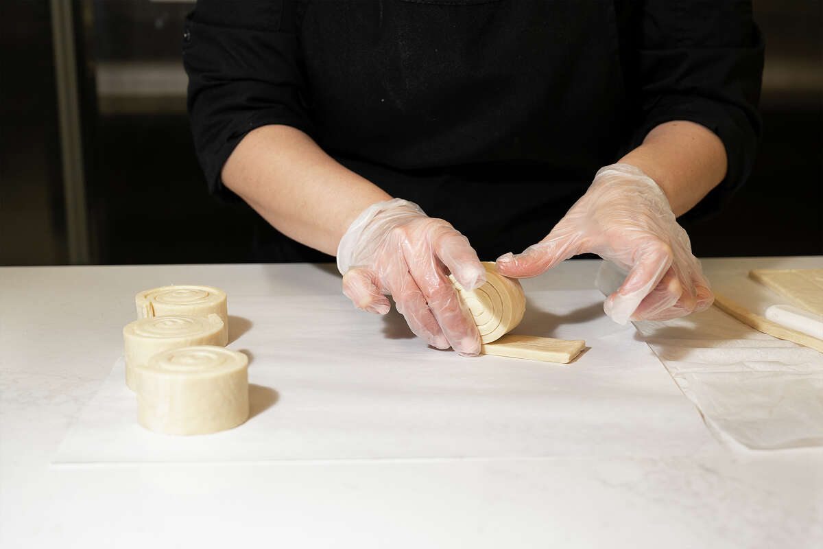 Chef Maliheh Sadeghi showing how they make "The Spiral" at Marvel Cake in Campbell CA, Jan. 13, 2023