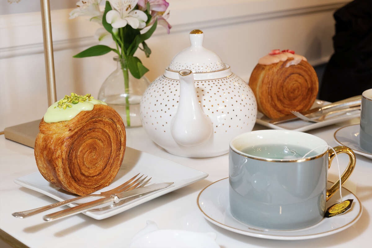 Pistachio and strawberry spiral croissants and tea at Marvel Cake in Campbell, Calif., Jan. 13, 2023.
