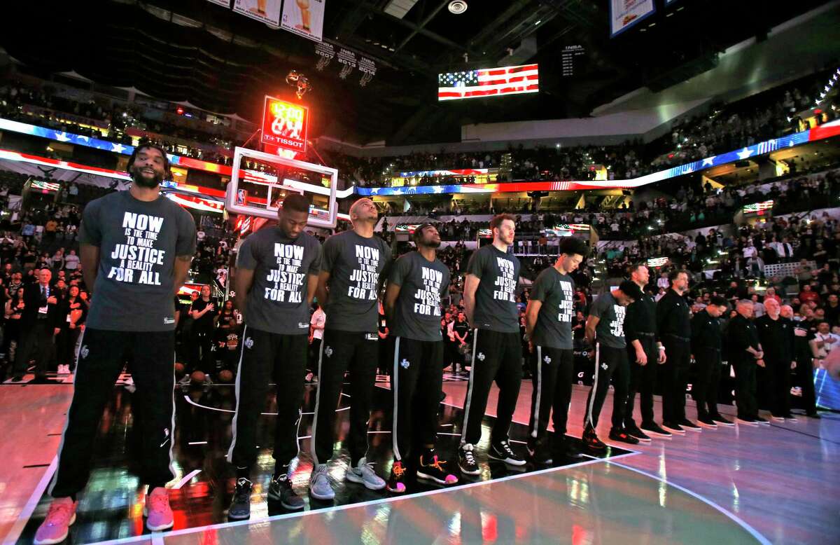 San Antonio Spurs line up for the National Anthem on Sunday, Jan. 15, 2022 at the AT&T Center. Sacramento Kings defeated the San Antonio Spurs 132-119.