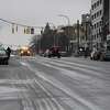 A layer of sleet covers Washington Ave. outside the Capitol on Thursday, Jan. 19, 2023, in Albany, N.Y.