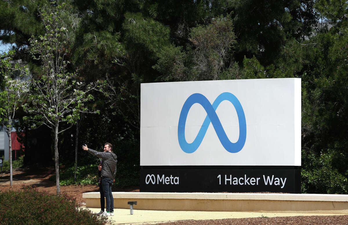 A sign is posted in front of Meta headquarters on April 28, 2022, in Menlo Park, Calif. Meta has recently scrapped a large portion of its office space in San Francisco.
