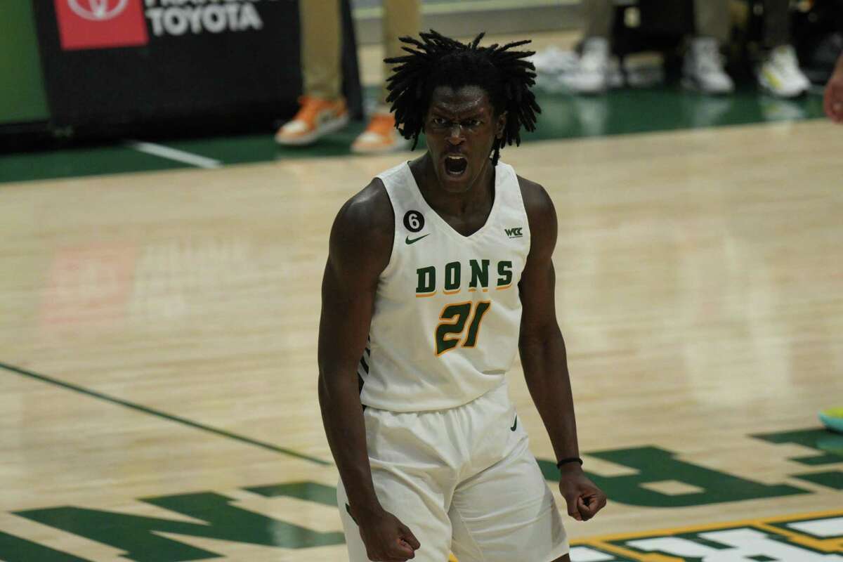 USF's Ndewedo Newbury is enthused in the first half of the Dons' game against Pacific on Thursday night.